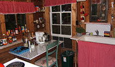 Brings back memories! Enjoy country kitchen accommodations, complete with pots, pans and old Wedgewood china.